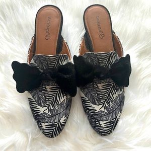 Navy mules with natural print.